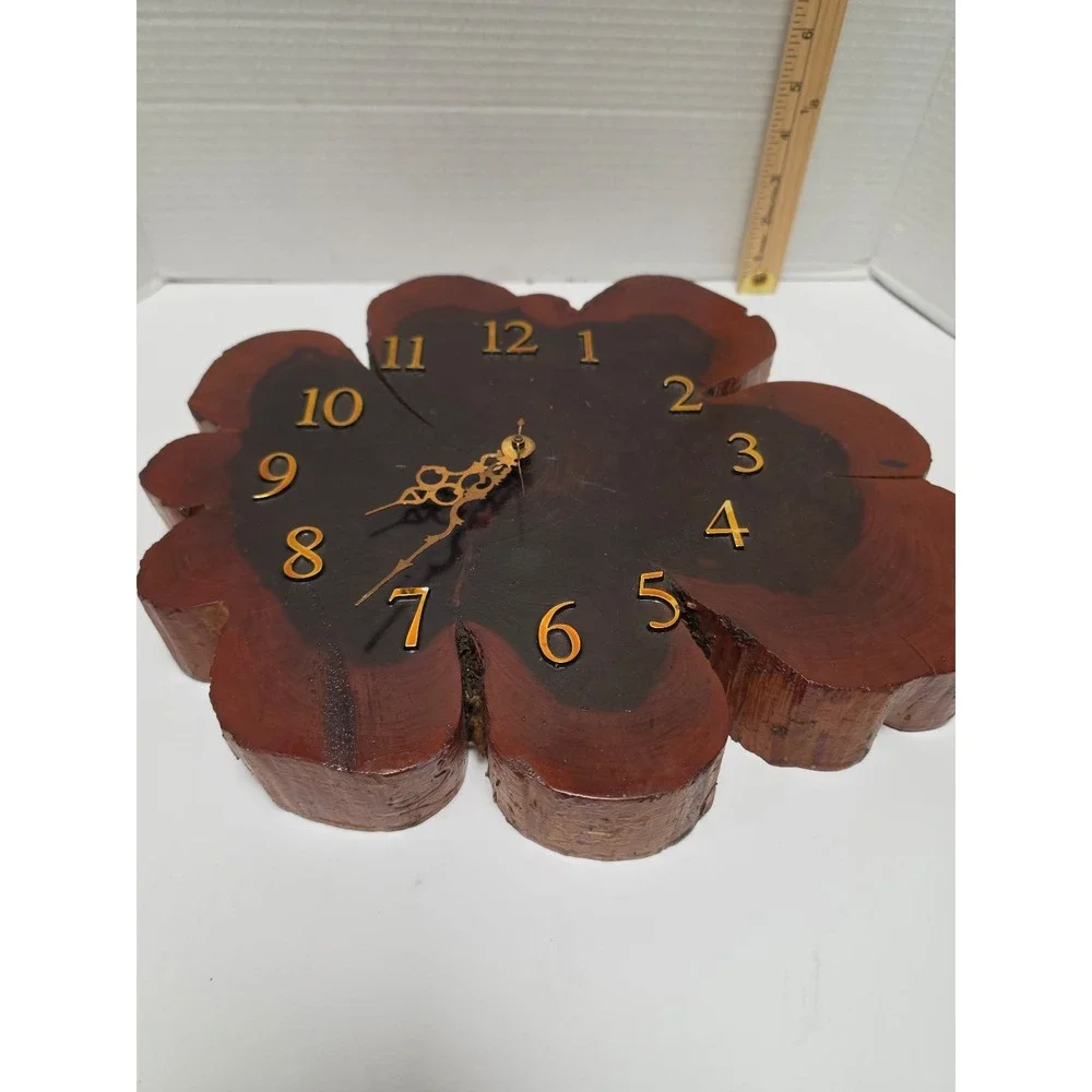 vintage live-edge wall clock is crafted from a natural wood tree slice,